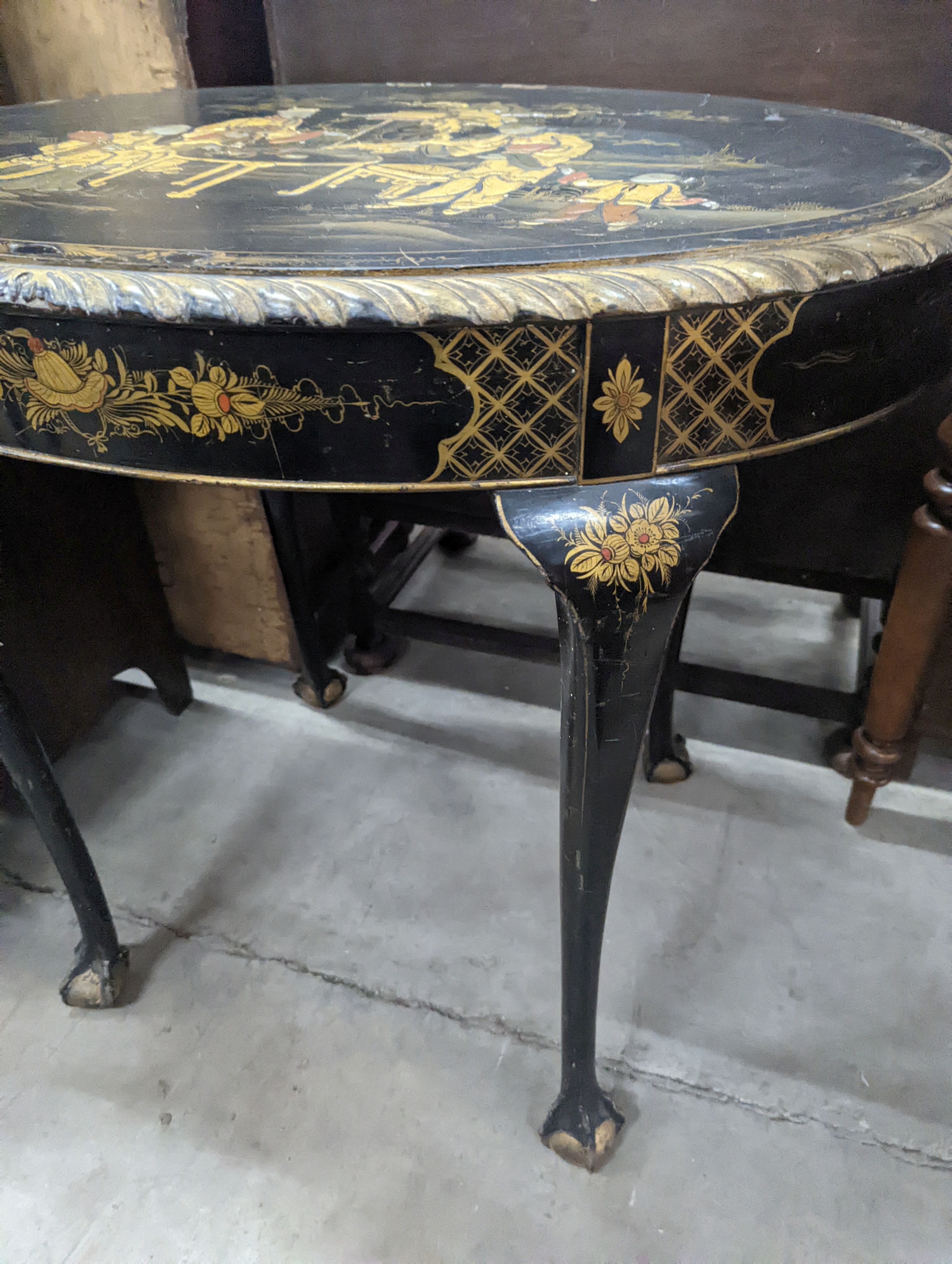 An early 20th century chinoiserie lacquer oval centre table, length 84cm, depth 59cm, height 77cm